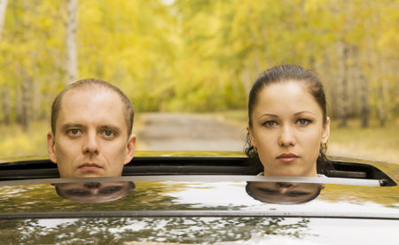 sad couple in a carの写真素材