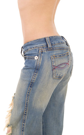 woman in old jeans on whiteの写真素材