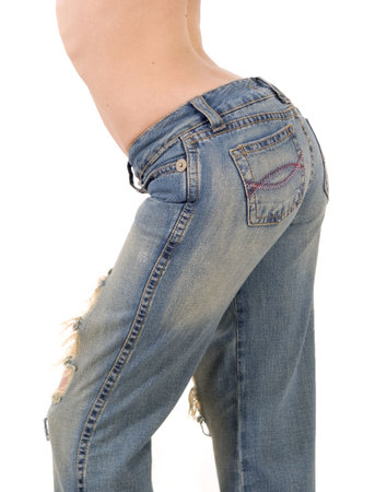 woman in old jeans on whiteの写真素材