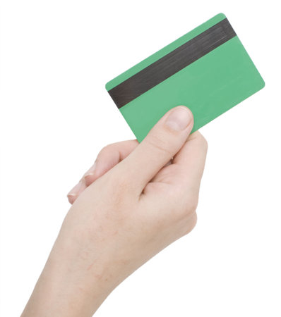 hand holding credit card isolated on whiteの写真素材