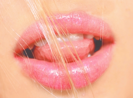 close up of open woman mouthの写真素材