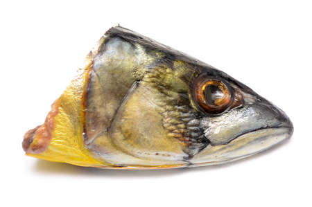 head of smoked mackerel isolated on whiteの写真素材