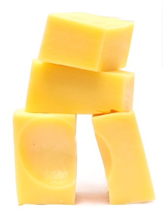 cheese cubes isolated on whiteの写真素材