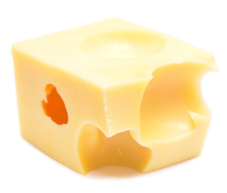 piece of cheese isolated on whiteの写真素材