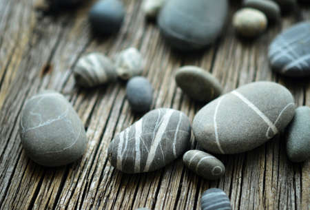 pebbles on wooden backgroundの写真素材
