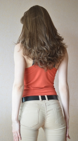 back view of young beautiful womanの写真素材