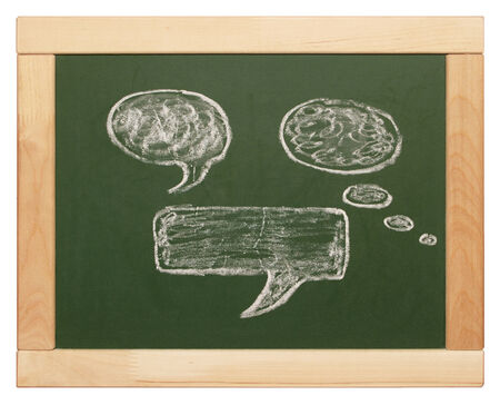 thought bubbles on blackboardの写真素材