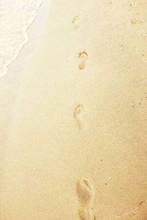 footprints on sand beachの写真素材