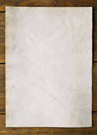 old paper on wooden background