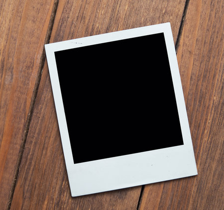 polaroid on wooden backgroundの写真素材