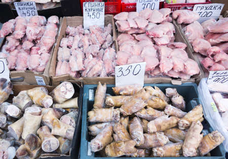 raw meat in a local marketの写真素材