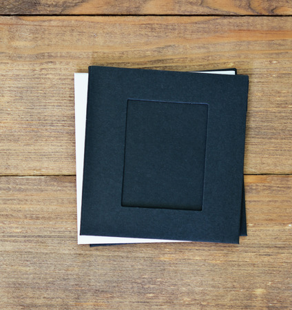 stack of photo frames on wooden backgroundの写真素材