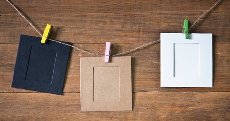 photo frames on wooden backgroundの写真素材