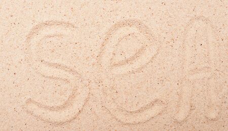 Sea writing on sandの写真素材