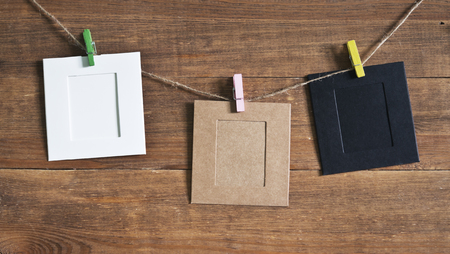 photo frames on wooden backgroundの写真素材