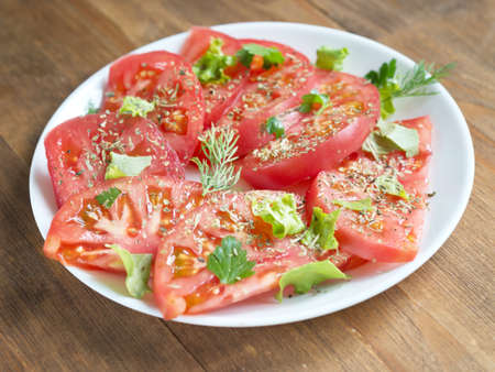 summer tomato salad with spicesの写真素材