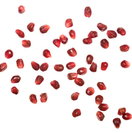 pomegranate seeds isolated on white backgroundの写真素材