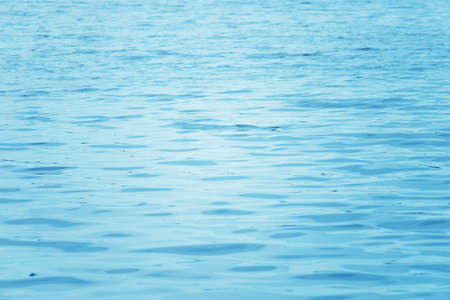 sea water surface as backgroundの写真素材