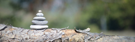 pebble tower with soft bokehの写真素材