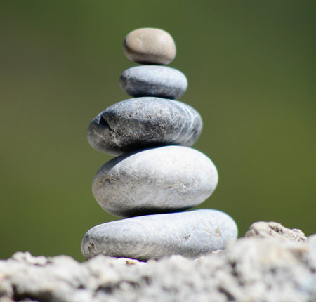 balancing stones with beautiful bokeh