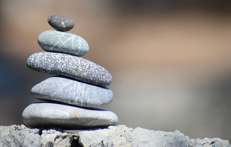 balancing stones with beautiful bokeh