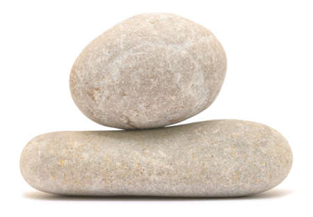 balancing stone tower isolated on white background
