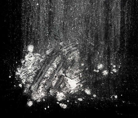 white powder on black backgroundの写真素材