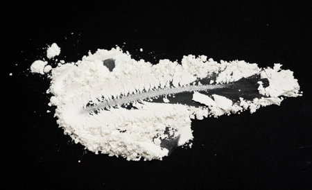 white powder on black background