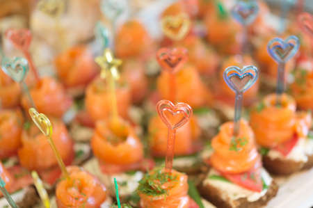 canapes with red fish(focus on sticks)