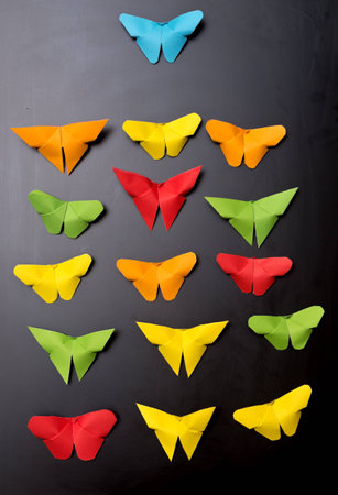 origami butterflies on a black backgroundの写真素材