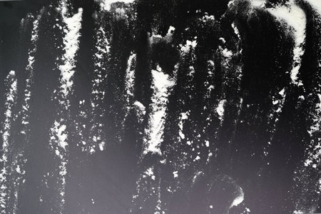 wheat flour on black background
