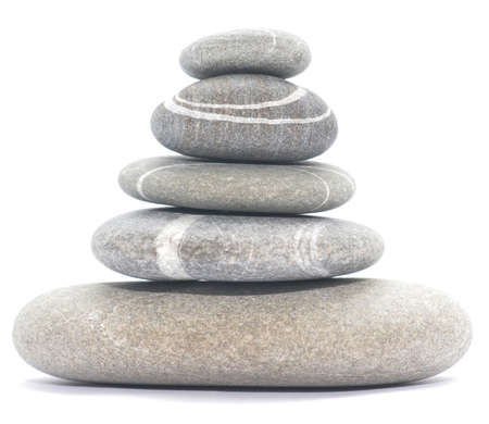 balancing stones isolated on white background