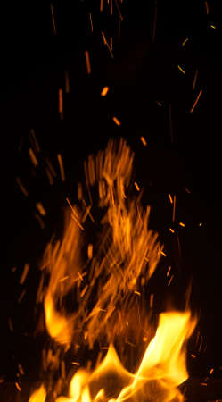 fire flames with sparks on black backgroundの写真素材