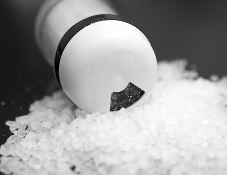 salt shaker on a black backgroundの写真素材