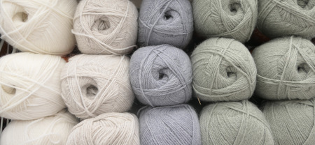 Close up shot of colored wool yarn balls