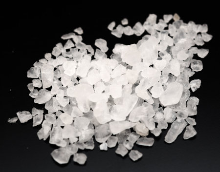 Sea salt on a black background
