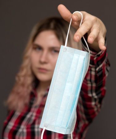 Young woman with medical mask