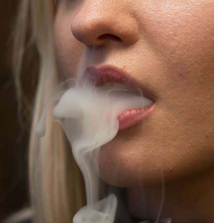 Close up shot of woman smoking