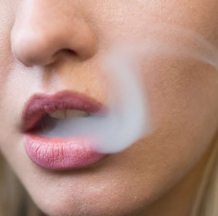 Close up shot of woman smokingの写真素材