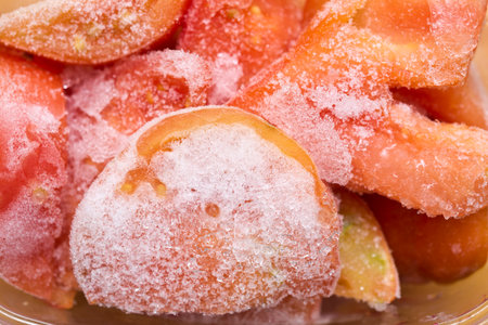 Close up shot of sliced frozen tomatoesの写真素材