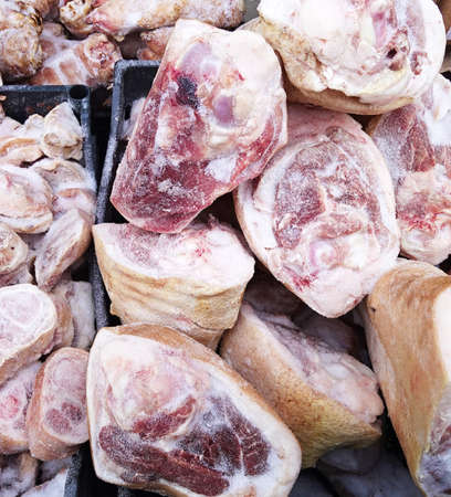 Frozen pork knickle at a market