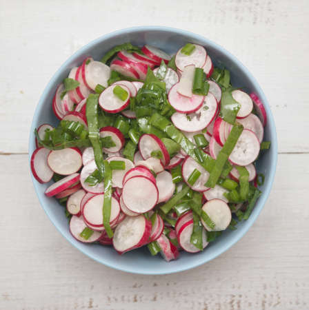 Radish salad with sorrel and green onion. Top viewの写真素材