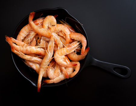 Cooked shrimps in a pan. Top viewの写真素材