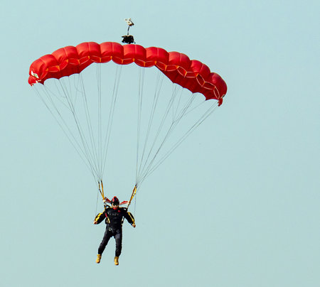 Skydiver in a blue sky