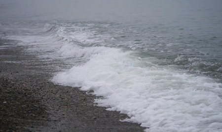 Dark foggy coast. Dramatic atmosphereの写真素材