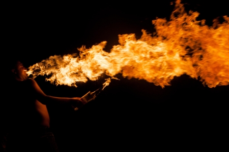 fire-show, man in action with fireの写真素材