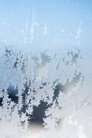 ice patterns on winter glassの写真素材