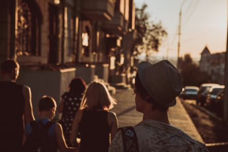 Young tourist at sunsetの写真素材