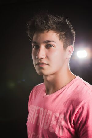 Casual Man with Arms Crossed isolated on black background