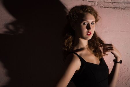 Noir portrait of attractive brunette girlの写真素材